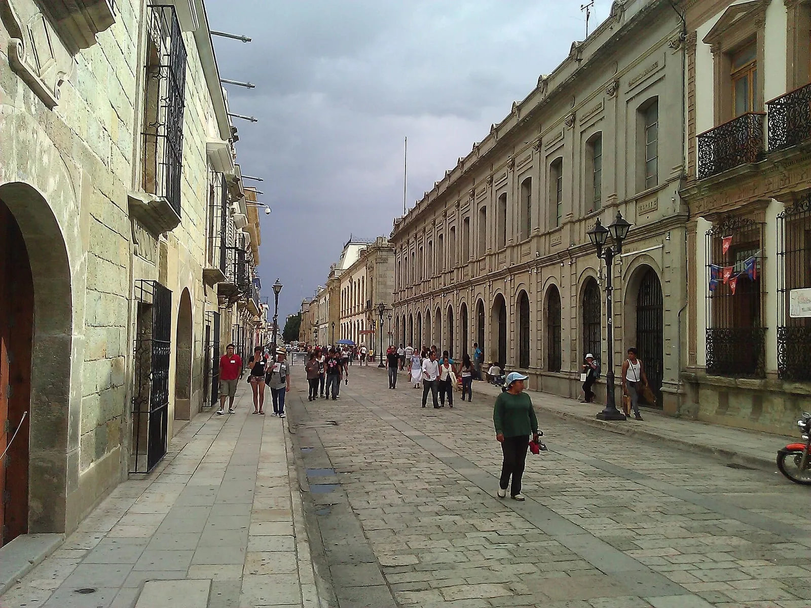 Pastel-coloured colonial buildings on a street in central Oaxaca, Mexico