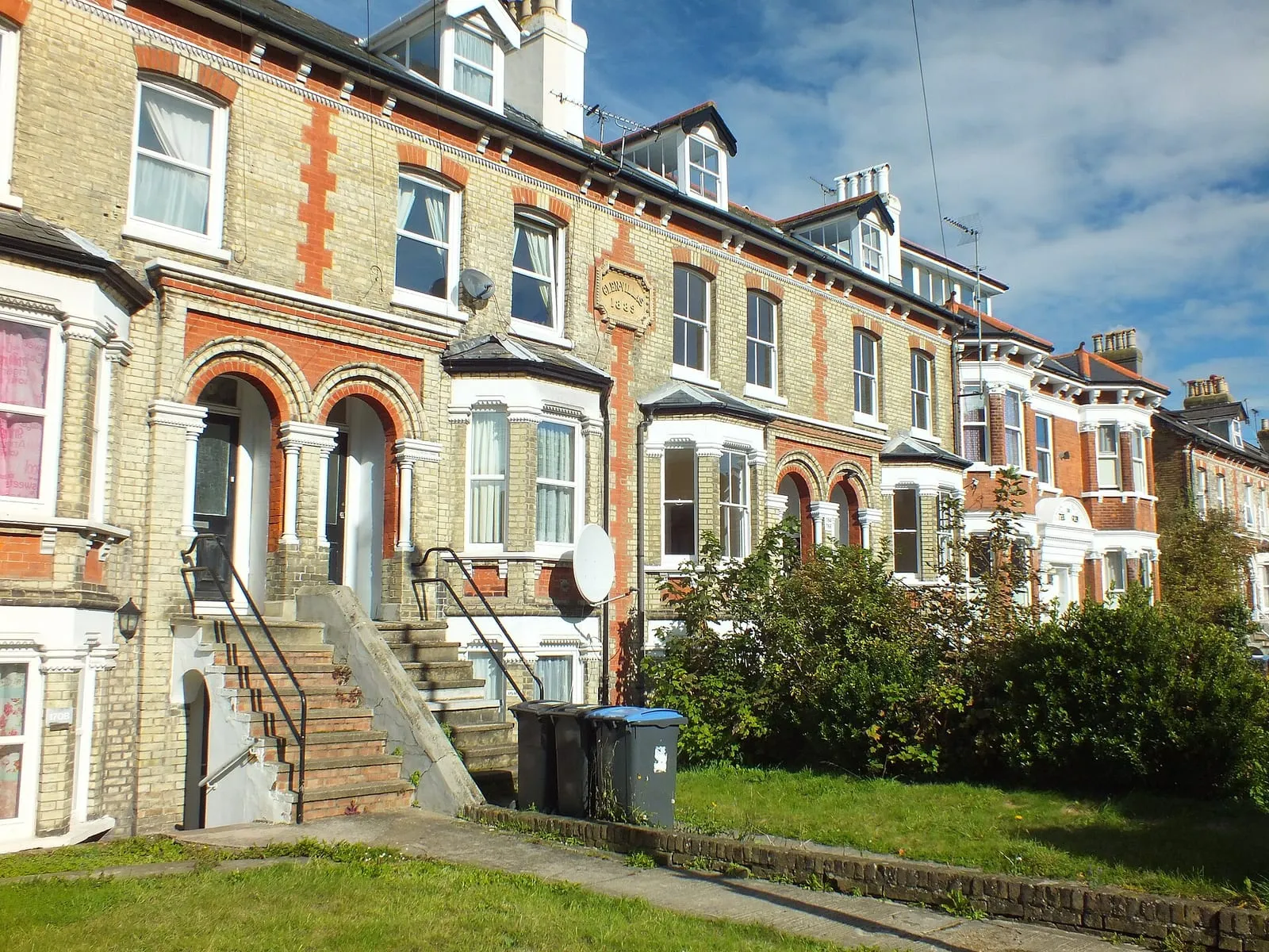 A row of terraced residential houses on a London street, the kind of housing stock most renters in the city actually live in.