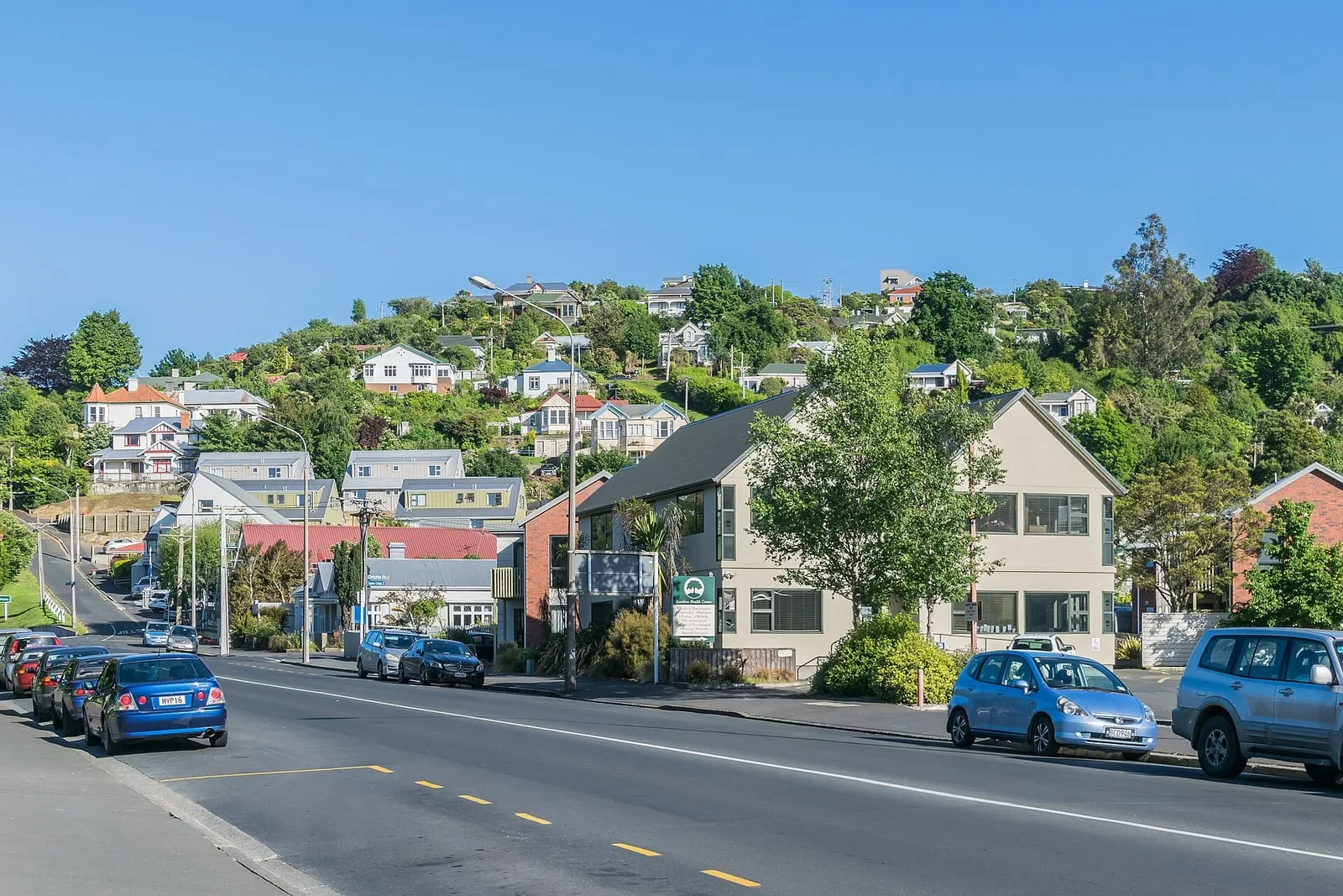 Bank Street in Dunedin, New Zealand, lined with historic stone buildings